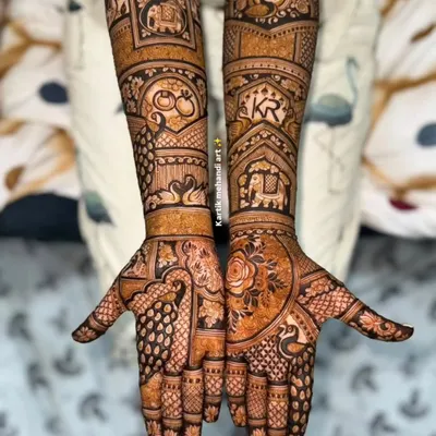 A beautiful engagement mehandi that tells a story of two hearts becoming one. This design includes the couple's initials, elephants, and other meaningful symbols, perfect for celebrating your new beginning.