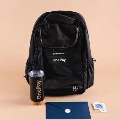 A complete new joinee kit we curated for OnePay. This onboarding gift includes a branded backpack, a sleek tumbler, a welcome letter, and stickers to make their first day memorable.