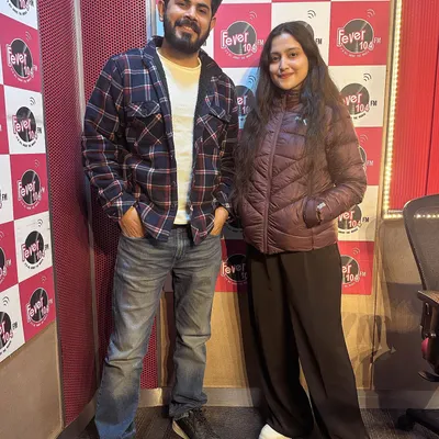 At the Fever FM 104 studio with my husband and bandmate, Nandan. We were there to talk about our original song "Noor E Jabeen" and our musical journey together.
