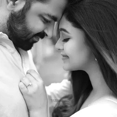 An intimate black and white portrait that focuses on the quiet connection between a couple. By removing color, we emphasize the emotion, tenderness, and the simple act of being together.