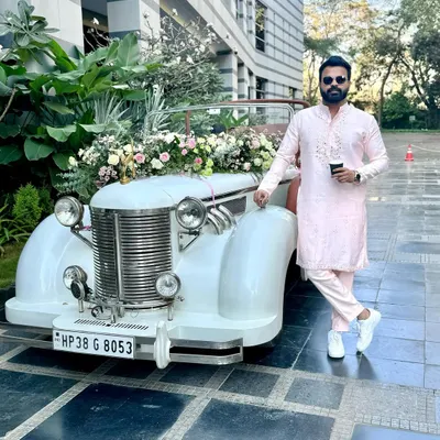 Vintage ride, modern beats. Getting into Baraat mode at the Grand Hyatt, Mumbai. I am ready to bring the energy and get the wedding procession started in style.