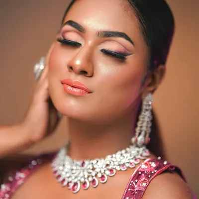 A close-up of a glamorous look on a beautiful dusky skin tone. You will learn color theory and techniques to make every skin tone glow.