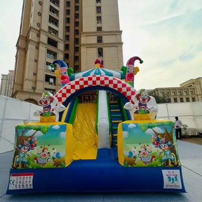 Our clown-themed bouncy castle is the perfect centerpiece for a carnival or circus party. The bright colors, checkered top, and friendly clown figures create a fun and festive atmosphere for any outdoor gathering.