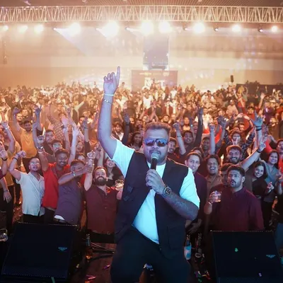 The view from the stage at 'The Next Orbit' for MakeMyTrip. An incredible sea of people, hands in the air, completely lost in the music. This is what a successful corporate party looks like.