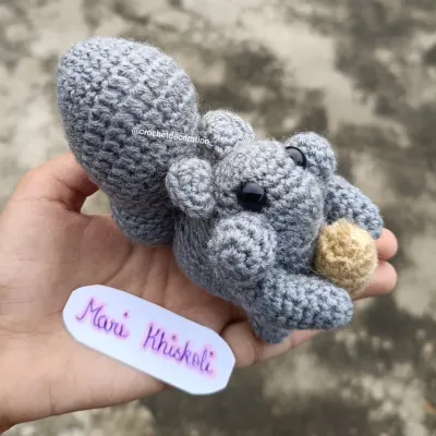 A closer look at the detailed stitch work on our popular 'Mari Khiskoli' crochet squirrel. We focus on creating a firm, high-quality finish so our toys can withstand plenty of hugs.