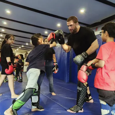 We teach them young. Our kids' martial arts classes are about more than just fighting; they build confidence, hand eye coordination, and real self defense skills in a disciplined and supportive environment.