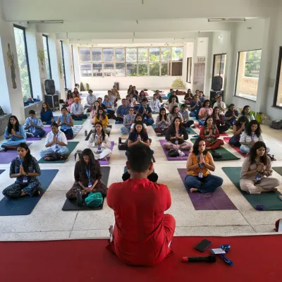 Leading a meditation session at our Pravāh retreat in Rishikesh. The energy of the group in such a sacred place makes these sessions incredibly powerful for finding inner peace and clarity.