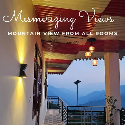 The mesmerizing view from the balcony of our farm stay. Every room opens up to the mountains, ensuring that you are always surrounded by the tranquil beauty of the Himalayas.