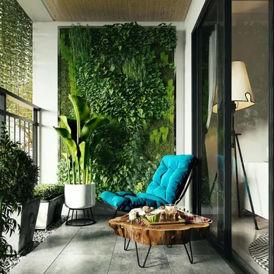 A perfect example of a balcony transformed by a lush vertical garden. This living wall provides a stunning green feature, enhancing the ambiance and making the small space feel like a private jungle retreat.