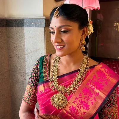 A close-up of the bride-to-be's makeup, showing the soft gold shimmer on the eyes and the clean, simple base. This look was designed to photograph beautifully while still feeling light and natural.