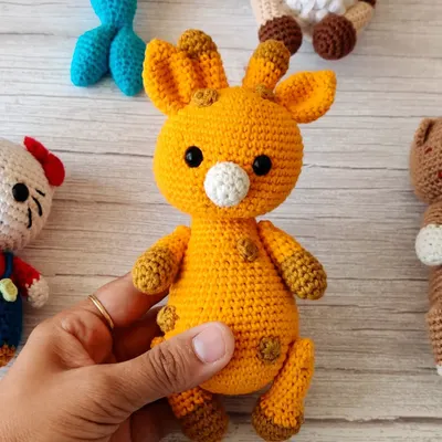 This little crochet giraffe is one of my favorite animal creations. It's soft, cuddly, and makes a wonderful gift for a newborn or toddler.