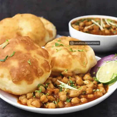 A favorite from North India, our Chole Bhatura is a perfect choice for a hearty meal. We serve fluffy, freshly fried bhaturas with a rich and flavorful chickpea curry, making it a guaranteed hit at any event.