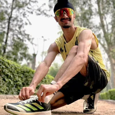 Getting ready for a run. Cardiovascular endurance is the foundation of all my training. It's about having the stamina to outlast your opponent in the final moments.