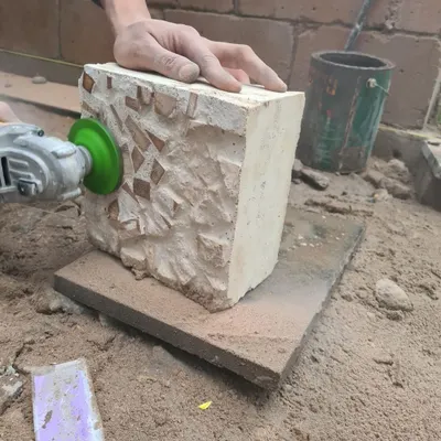 We are always exploring ways to use waste materials. Here, we are testing a new type of wall cast using wood waste from a furniture factory, with wood chips substituting for aggregate.
