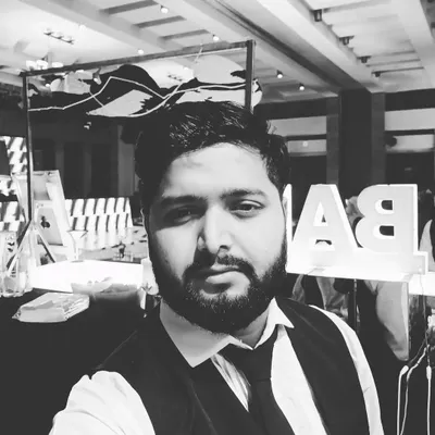 A quick photo of me, Amit, at an event. I'm always on-site with my team to make sure everything runs smoothly and your bar experience is perfect.
