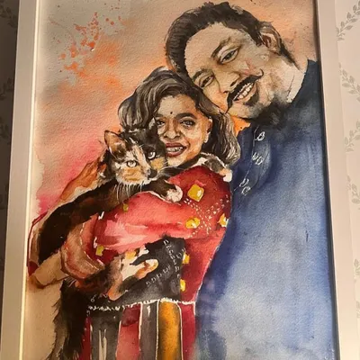 This commissioned watercolor portrait captures a beautiful family moment with a couple and their cat. It's a joy to paint these connections, creating a piece that will be a treasured part of their home.