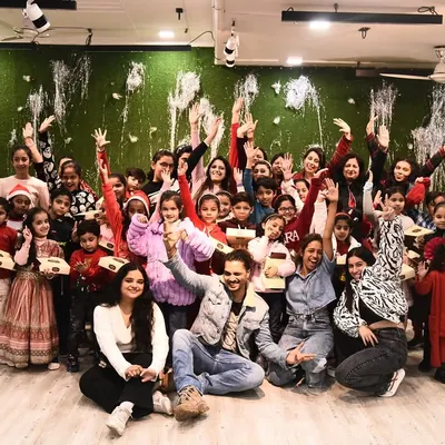 Our entire studio family gathered for our Christmas party. This photo captures the joy, laughter, and community spirit that we cherish.