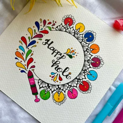 Happy Holi! This piece captures the joyful chaos of the festival of colors. A mandala border made of colorful splashes bursts from a 'pichkari', creating a fun and festive artwork.