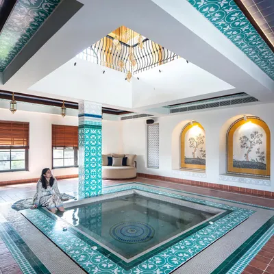 The indoor swimming pool at our Wanderlust Villa project is a true sanctuary. Inspired by Moroccan design, it features custom turquoise mosaic tiles, arched niches, and a dramatic skylight, creating a space for ultimate relaxation.