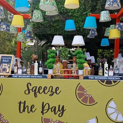 An example of our themed bar capabilities with a 'Squeeze the Day' lemon-themed setup for a vibrant Mehendi party. We can match any theme, from the bar front and decor to the drinks menu itself.