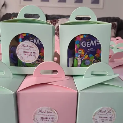 These mini choco boxes are a wonderful and affordable return gift idea. I created these for Twisha's 6th birthday party for her to share with friends, complete with personalized 'Thank You' stickers.