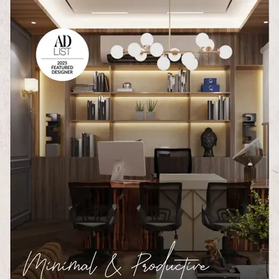 This home office design is minimal and productive. It features extensive built-in shelving with integrated lighting, a sleek desk, and ergonomic chairs, creating a workspace that is both stylish and highly functional.