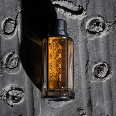 This is a high-concept shot for a Hugo Boss perfume, designed to be a hero image for an ad campaign. I created a unique, moon-like surface texture in the studio to give the product a rugged and adventurous feel, using dramatic top-down lighting to carve out the details of the bottle and the craters.