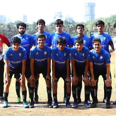 Our MFA Third Division team posing before a match. This squad is a mix of promising young talent and experienced players from our working professionals program.