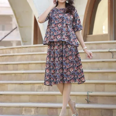 My Bagru hand-block printed co-ord set in a classic paisley design. The peplum top and tiered skirt create a flattering silhouette that can be dressed up with heels.