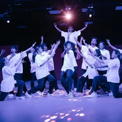 The final pose from our "Allstars Night" student showcase. This is the powerful end product of our pro-performance batch, where students learn complex group choreography and stage presence.
