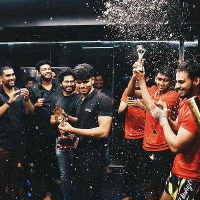The moment of victory. Our fighters celebrate a win at the club wars, a testament to their hard work and dedication.