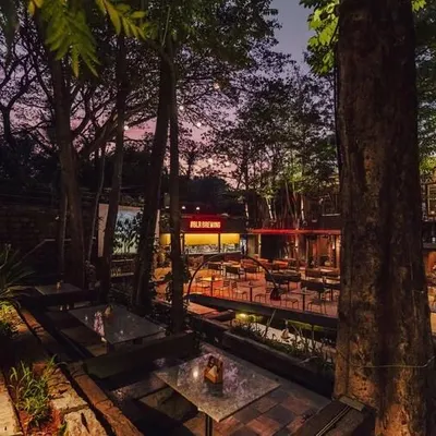 Our expansive brewpub and outdoor area is the ideal venue for large corporate parties like this New Year's Eve event, with multiple bars, a massive dance floor, and live food counters.