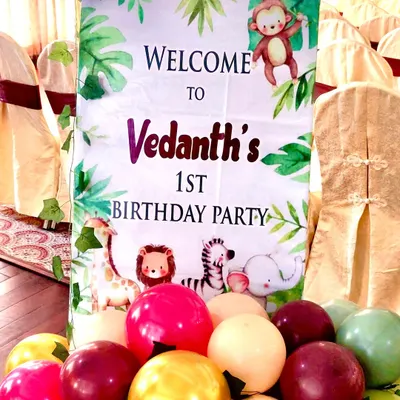 A custom welcome board for Vedanth's first birthday party. Designed to match the jungle theme, it features cute safari animals and tropical leaves, creating a perfect entrance piece for the event.