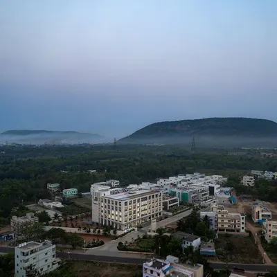 The Laurus Labs regional office in Vizag, set against a backdrop of hills, was designed for natural cross-ventilation, allowing it to function without air conditioning.