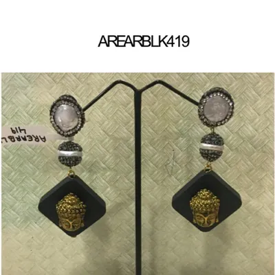 An example of the unique fashion jewelry we offer. These statement earrings feature a Buddha motif, pearl-like studs, and a modern geometric design, perfect for adding a finishing touch to your outfit.