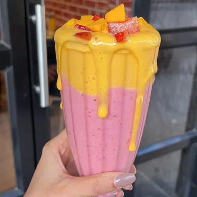 For all the mango lovers, our seasonal mango and strawberry shake is a dream come true. It's thick, creamy, and topped with fresh fruit pieces.
