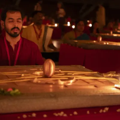 A moment of deep connection during the Yantra ceremony. With the Linga Bhairavi present, the space is filled with a vibrant, living energy that supports every seeker's journey.