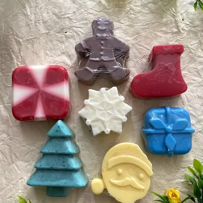 My Christmas-themed soap set is so much fun to make. It includes a gingerbread man, stocking, snowflake, gift box, tree, and Santa, all made with my gentle camel milk formula.