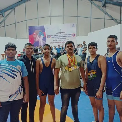 I am incredibly proud of my students' achievements. Here I am with our young champions after they won four gold medals and one silver at the Mumbai divisional school wrestling competition.