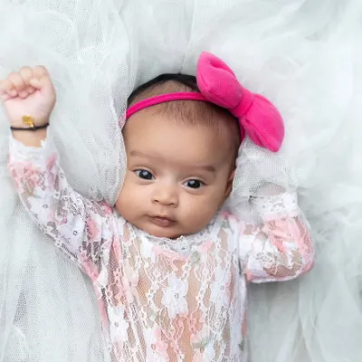 This little one is wide awake and looking right at the camera. I love capturing these moments of direct eye contact and curiosity.