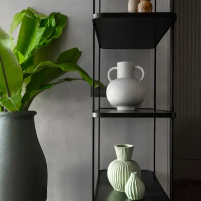 Good design is often in the little things that tie a space together. This simple white vase is one of our most-loved styling pieces, versatile enough to elevate any corner with its soft form and quiet presence.