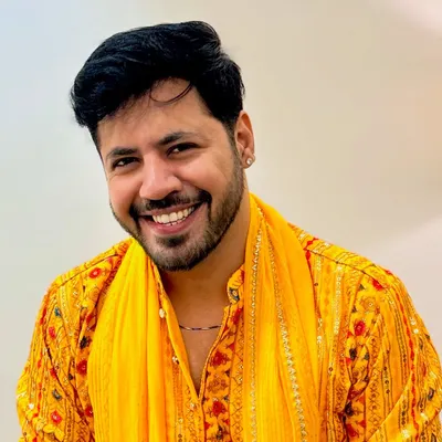 A close-up in a bright yellow kurta, ready for a festive celebration. This is my 'ethnic on the outside, romantic on the inside' look.