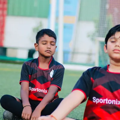 We end some sessions with quiet reflection. This cool-down meditation helps our young players center themselves and appreciate their hard work.
