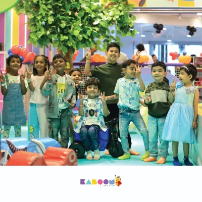 Peace and smiles from this awesome group of friends! Kaboom is the perfect spot for a playdate.