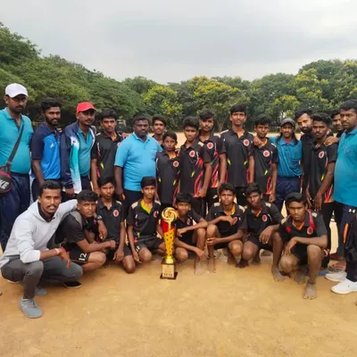 The whole family together. Our Under 17 boys team with their coaches and their well-earned trophy. This is what our community is all about.