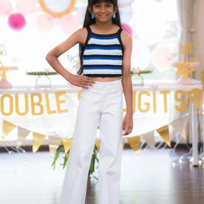One of my favorite client photos. She’s celebrating her birthday in a custom-fit striped halter neck top. I love making special pieces for special days.