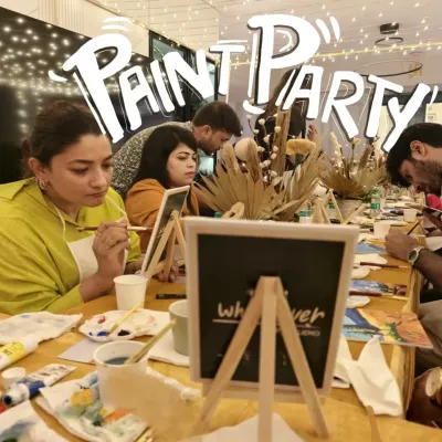 This is the vibrant, focused energy of our paint parties. We set up a long table where guests can sit together, paint, and socialize. It's a wonderful icebreaker and a relaxing way to connect at any event.