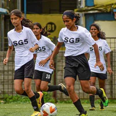 Our Lionesses showing skill and determination on the ball during a competitive match. We focus on developing strong, confident female players.
