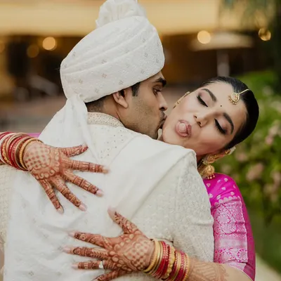 A playful and candid moment between the bride and groom. This is the kind of unscripted joy I love to capture, showing the fun and comfortable love they share.