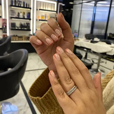 A beautiful and soft ombré design on natural nails, showing that you can have an elegant gradient effect without extensions.